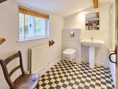 a bathroom with a sink and a toilet at Host & Stay - The Bell House in Canterbury