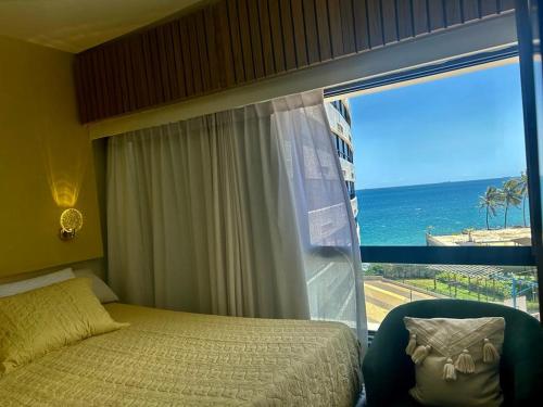 Postel nebo postele na pokoji v ubytování apart hotel 2 quartos frente mar