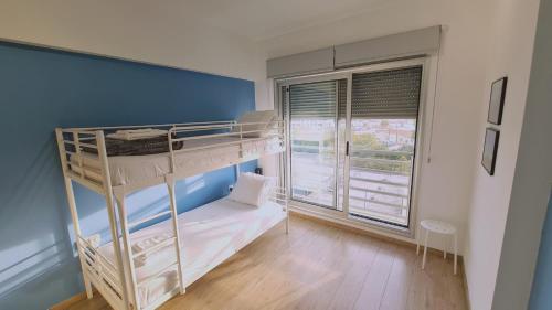 a room with two bunk beds and a window at STAY Mystique City Penthouse in Limassol