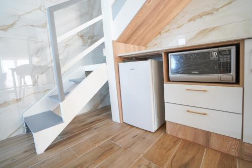 Kuchyň nebo kuchyňský kout v ubytování Ocean Vibes
