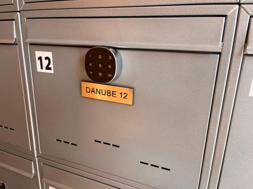 a sign that says danger on a metal locker at Danube12 in Šamorín
