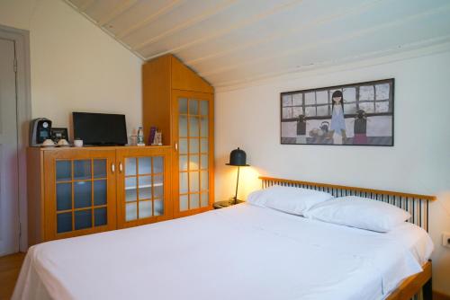 Ένα ή περισσότερα κρεβάτια σε δωμάτιο στο Serguzest Otel