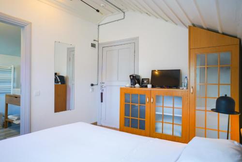 Ένα ή περισσότερα κρεβάτια σε δωμάτιο στο Serguzest Otel