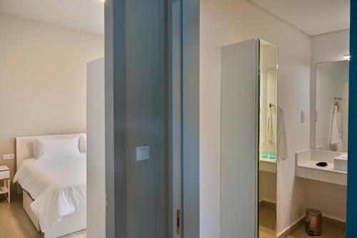 Koupelna v ubytování Royal Green Wellness Resort