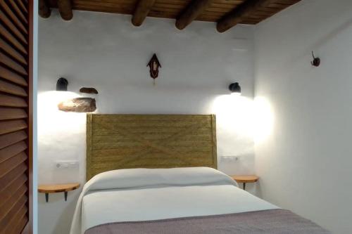 Lova arba lovos apgyvendinimo įstaigoje Mi Casita - Higuera de la Sierra