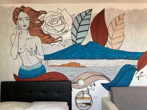 A seating area at NAPOLI MOOD Il Golfo Apartments