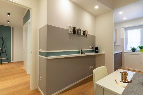 a kitchen with a sink and a counter top at Silverius - Roma's Delightful Lodges in Rome