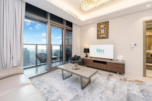 Posezení v ubytování FAM Living - Paramount Towers - 5 mins to Dubai Mall - 1 BR