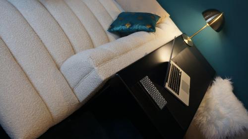 a bed in a room with at The Townhouse in Udine