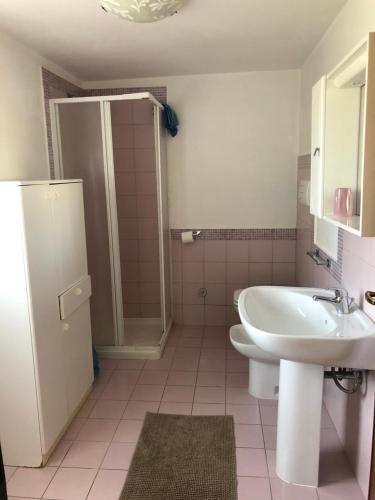 a bathroom with a sink and a toilet and a shower at APPARTAMENTO Tamburro in Campobasso