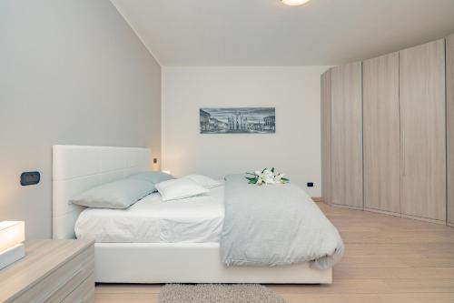 Postel nebo postele na pokoji v ubytování Milan Forum Camelia Guesthouse
