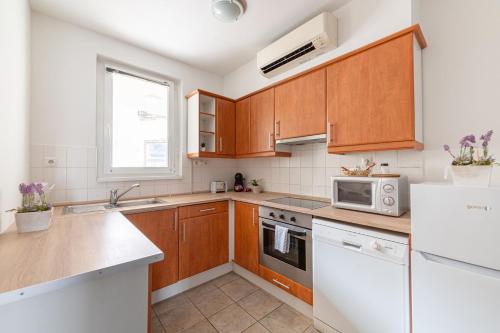 Kuchyňa alebo kuchynka v ubytovaní Nova Apartments