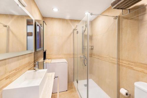 a bathroom with a shower and a sink at Beautiful Arenas Negras By Paramount Holidays in Puerto de Santiago