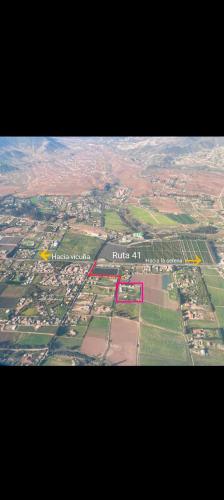 an aerial view of a field from an airplane at Fogones del Valle in Las Rojas