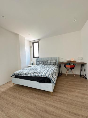 Cama o camas de una habitación en 9 Tan Yuan Homestay
