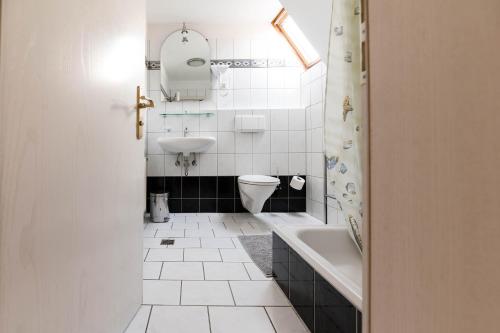 Koupelna v ubytování Hotel Leone d´Oro