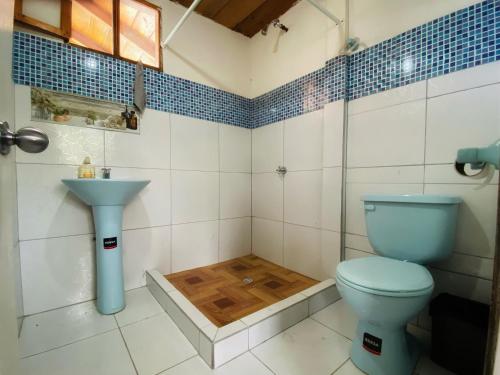 Koupelna v ubytování Inti Mindo Hostel
