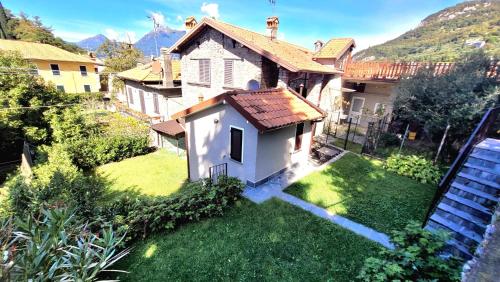 an aerial view of a house with a yard at Castello di Vezio in the Village in Varenna