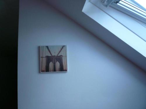 a picture of a bridge on the side of a building at Ardenlea House Hotel B&b in Dyce