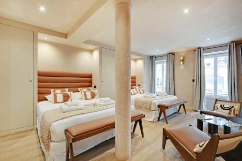 En eller flere senge i et værelse på Amazing Residence Caire Montorgueil