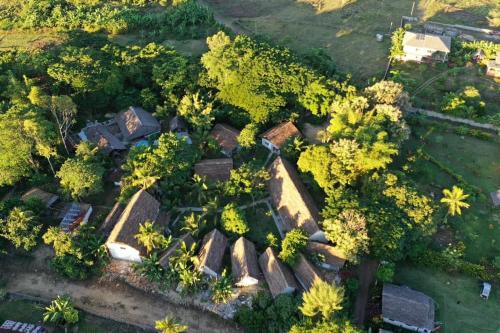an aerial view of a house with trees at Kintana Hotel SPA in Dzamandzar