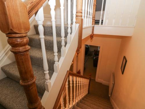 an overhead view of a staircase with wooden railings at Heatherlea in Keswick