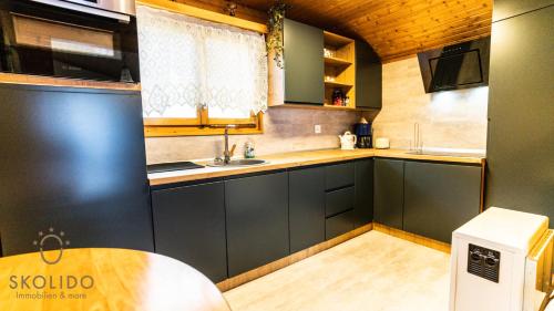 Kuchyň nebo kuchyňský kout v ubytování Chalet Independent, Termen