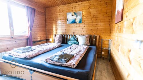 Postel nebo postele na pokoji v ubytování Chalet Independent, Termen
