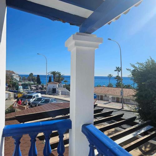 a view of the ocean from a balcony at Marazul By Fitzgeralds in Nerja
