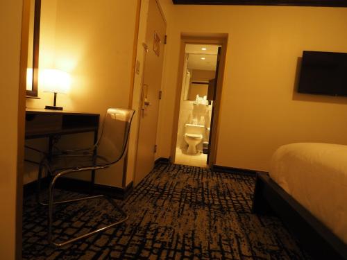 Postel nebo postele na pokoji v ubytování Night Hotel Broadway