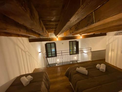 a living room with a couch and a bed at signoria flat 5* centro storico in Florence
