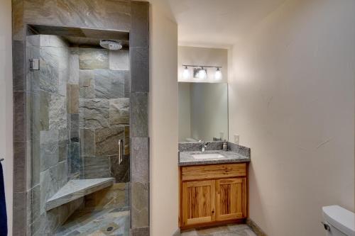 a bathroom with a sink and a shower at Tall Pine Chalet in Stateline