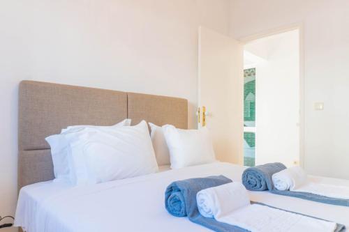 Кровать или кровати в номере Mosteiros Natural Pool House