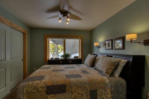 a bedroom with a bed and a window at Rock Haven in Stateline