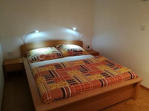 Postel nebo postele na pokoji v ubytování Apartmán Mocca