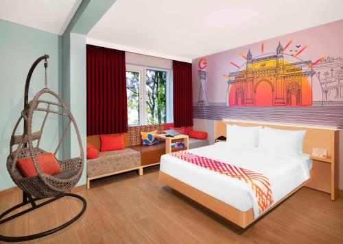 1 dormitorio con cama y columpio en Ginger Mumbai Airport, en Bombay