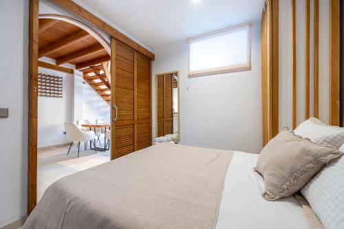 A bed or beds in a room at Loft en Milla de Oro