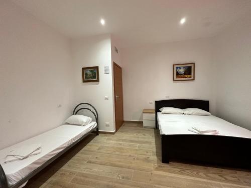 a room with two beds in a room at Dream holiday in Mestre