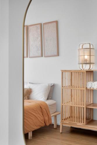 Una cama o camas en una habitación de The Beach Rooms