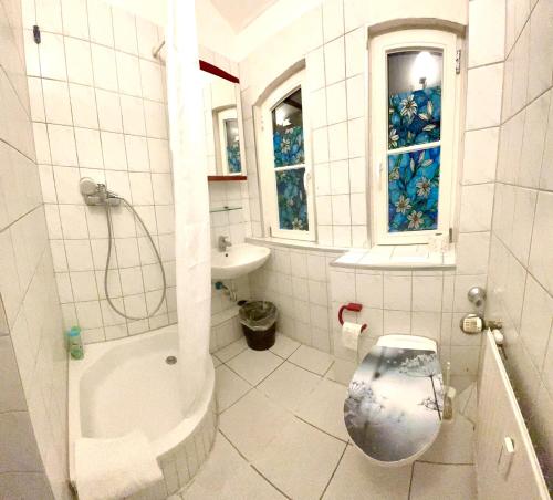 a bathroom with a toilet and a sink at New living Home in Seevetal