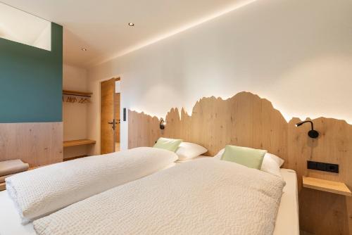 Katil atau katil-katil dalam bilik di Erbacher Living Nature Apartments Suites