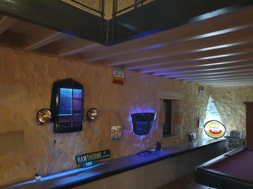 a bathroom with a sink and a mirror on the wall at exceptionnel loft style industriel tout équipé 15 personnes avec piscine et jacuzzi in Villebramar