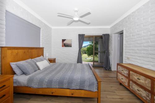 Ένα ή περισσότερα κρεβάτια σε δωμάτιο στο Altamira Along Bakers Creek