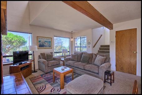 a living room with a couch and a tv at 2620 Merlyn in Cambria
