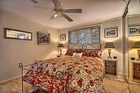 a bedroom with a bed and a ceiling fan at 275 Stafford in Cambria