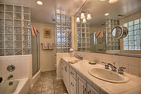 a bathroom with a sink and a tub and a tub at 275 Stafford in Cambria