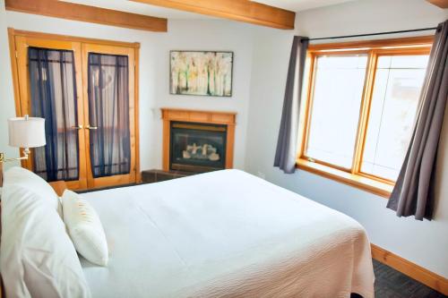 Ένα ή περισσότερα κρεβάτια σε δωμάτιο στο Terrace Suites