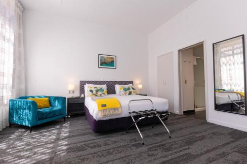 Ένα ή περισσότερα κρεβάτια σε δωμάτιο στο Quest Invercargill Serviced Apartments