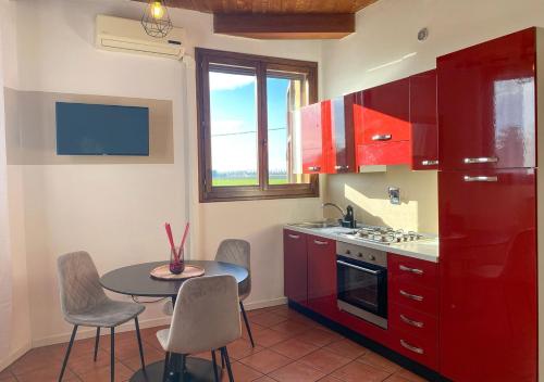 A kitchen or kitchenette at Velluto Suite Apartment