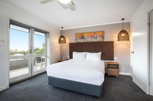 Postel nebo postele na pokoji v ubytování Doncaster Apartments by Nightcap Plus